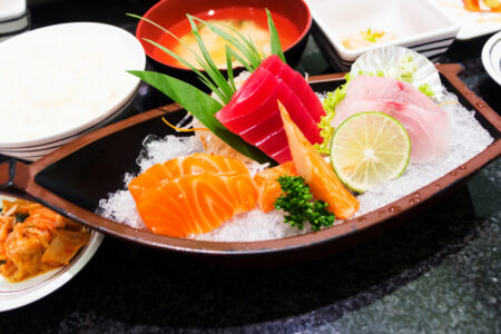 Sashimi fish varieties featuring tuna salmon yellowtail and white fish