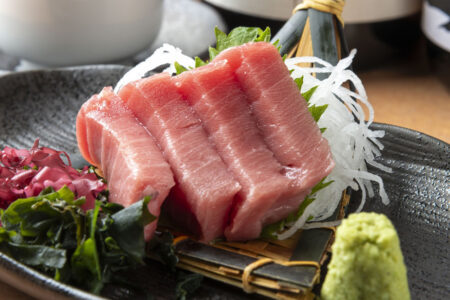 Sashimi Garnishes with shredded daikon, shiso leaves, and wasabi